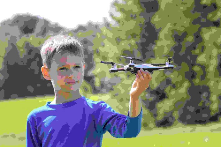Child playing with drtone